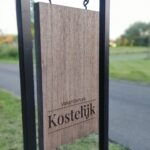 houten uithangbord graveren logo achterkant