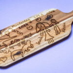 langwerpige borrelplank met kindertekening