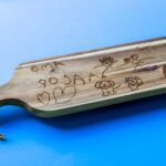 langwerpige borrelplank met kindertekening