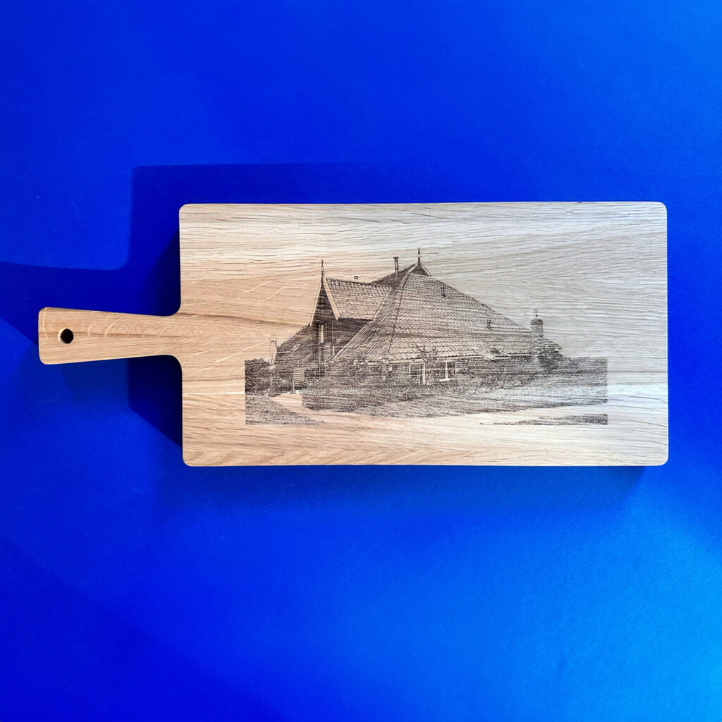 foto van huis op borrelplank laten graveren